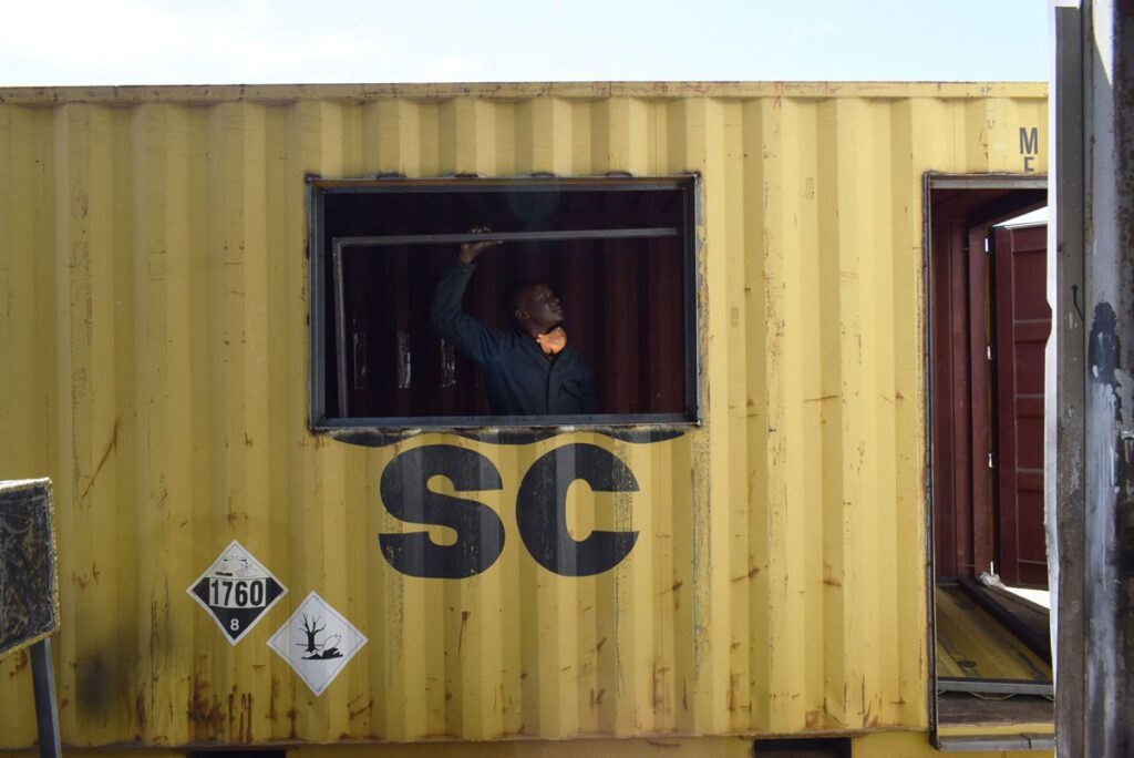 Man working on container conversion