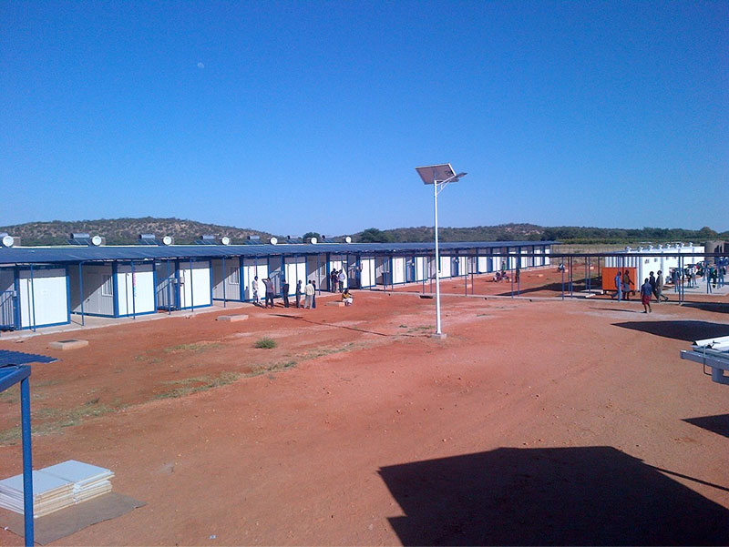 many mobile camp containers next to each other